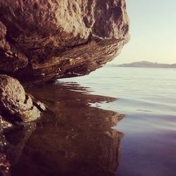 Scenic view of rock formation in sea