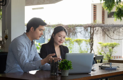 Business colleagues working in office