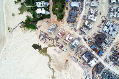 Aerial view of houses and buildings in town