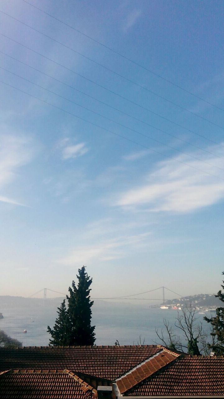 built structure, sky, architecture, building exterior, cloud - sky, roof, house, water, cloud, nature, residential structure, blue, sea, scenics, outdoors, no people, day, tree, tranquility, residential building