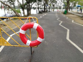 Red umbrella on ground