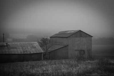 House on field against sky