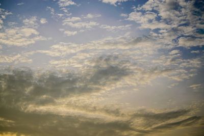 Low angle view of clouds in sky during sunset