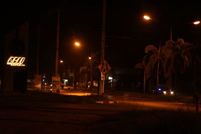 Illuminated street lights at night