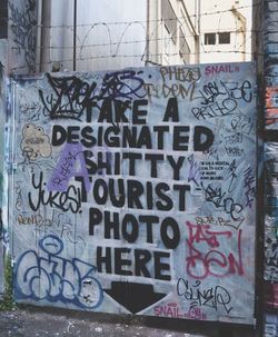 Close-up of text on wall