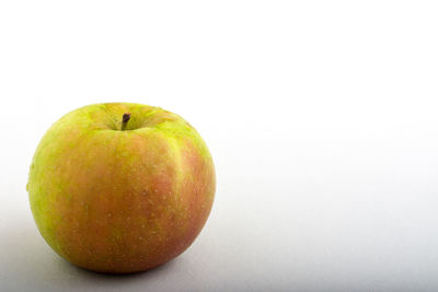 Close-up of apple against white background