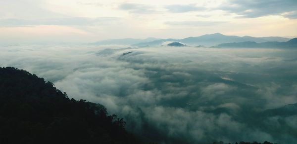 Scenic view of mountains against sky during sunset