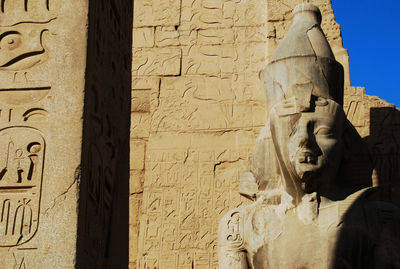 Low angle view of buddha statue