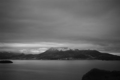 View of lake against cloudy sky