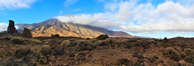 Panoramic view of mountains against sky