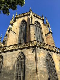 Low angle view of old building against sky