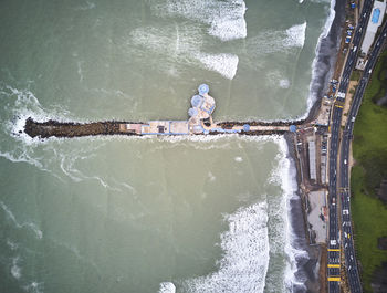 Aerial view of man in sea