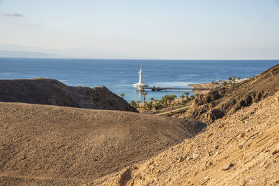 Mountains in the desert against the backdrop of the red sea