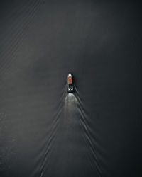 High angle view of person swimming in lake