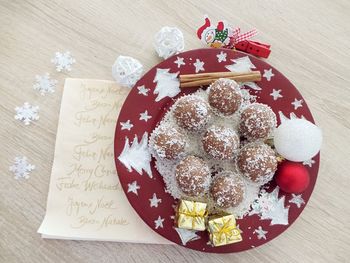 Directly above view of dessert with decorations on table