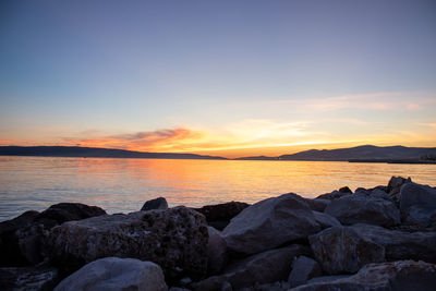 Scenic view of sea against sky during sunset