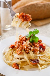 Close-up of pasta in plate on table