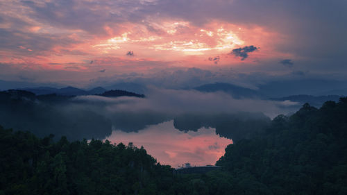 Scenic view of dramatic sky during sunset