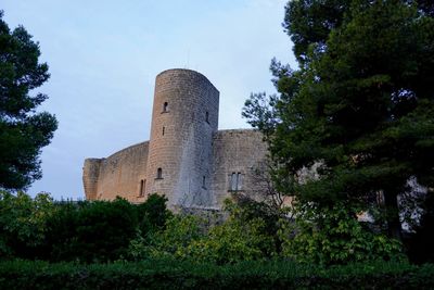 Low angle view of historic building against sky