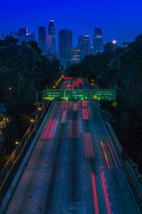 Light trails on city street at night