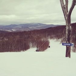 Scenic view of snow covered mountains