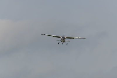 Low angle view of airplane in sky