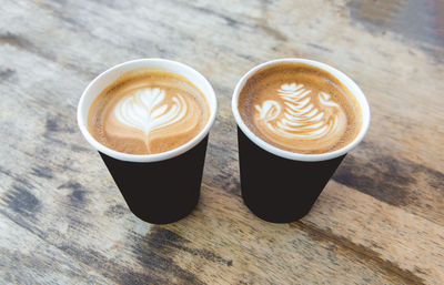 High angle view of cappuccino on table