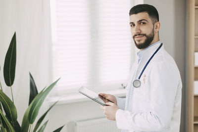 Young doctor working on digital tablet. medical concept