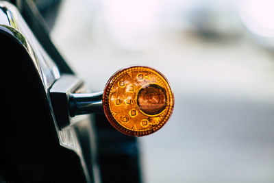 Close-up of clock on car