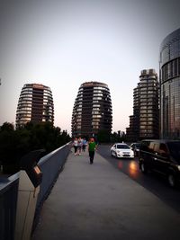 Modern buildings in city against sky