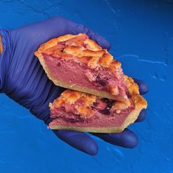 Close-up of hand holding meat