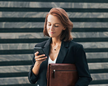 Young woman using mobile phone