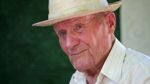 Portrait of man wearing hat