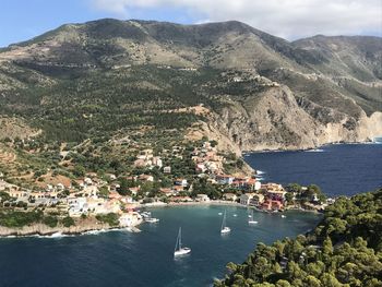 High angle view of townscape by sea