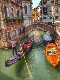 High angle view of gondolas in canal