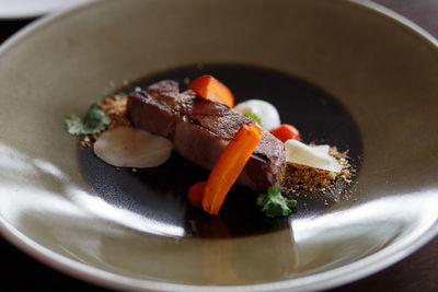 High angle view of beef steak served in plate