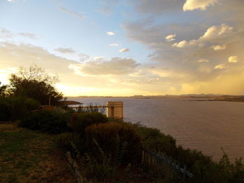 Scenic view of sea at sunset