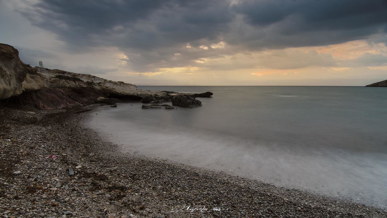 sky, water, sea, scenics - nature, cloud - sky, horizon, horizon over water, beauty in nature, tranquil scene, tranquility, beach, land, nature, sunset, idyllic, no people, non-urban scene, rock, solid, outdoors