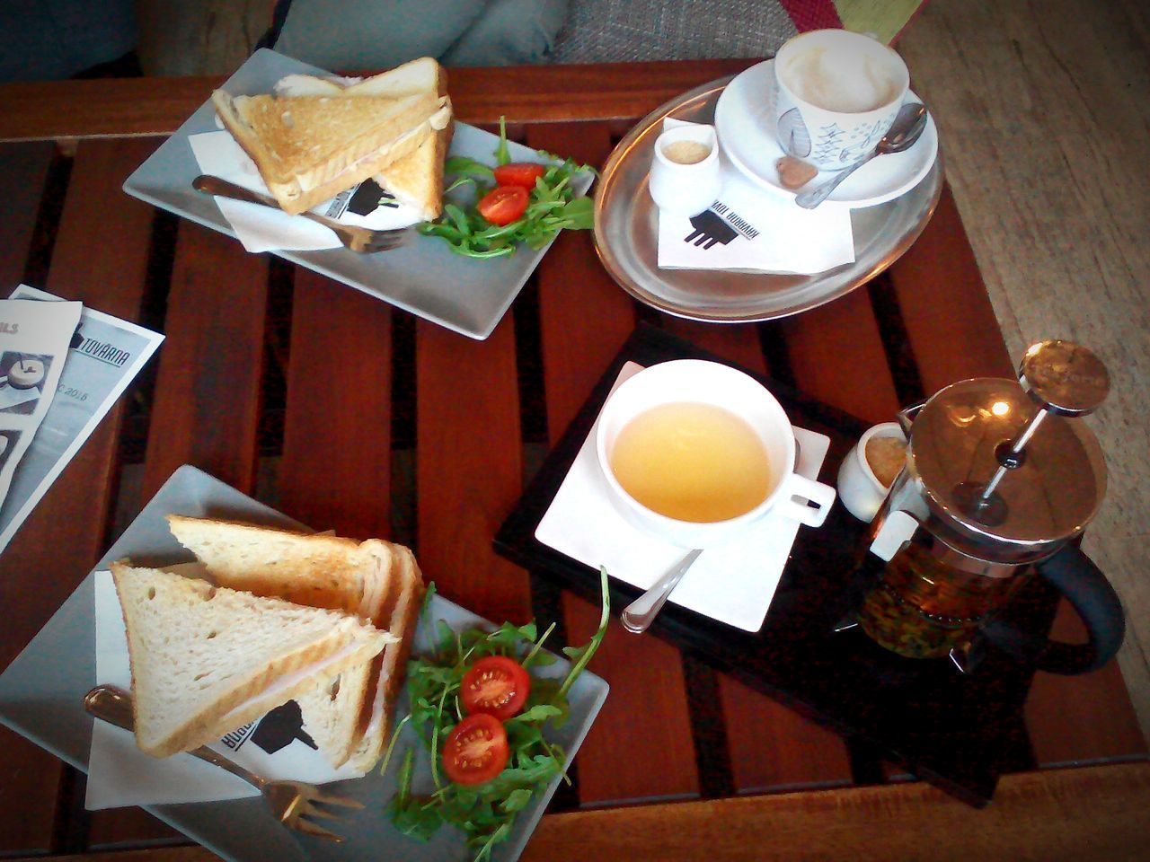 food and drink, table, indoors, drink, freshness, food, plate, coffee cup, refreshment, still life, coffee - drink, ready-to-eat, breakfast, bread, saucer, high angle view, healthy eating, fork, wood - material, serving size