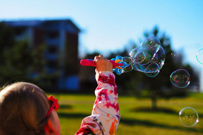 Children playing with bubbles