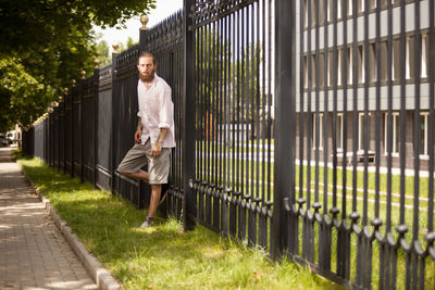 Rear view of man standing in park