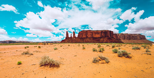 Panoramic view of rock formations on landscape against sky