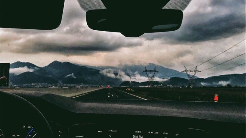 ROAD SEEN FROM CAR WINDSHIELD