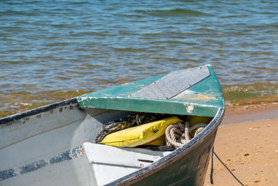 High angle view of boat moored on beach