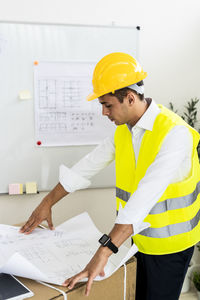 Man working with umbrella