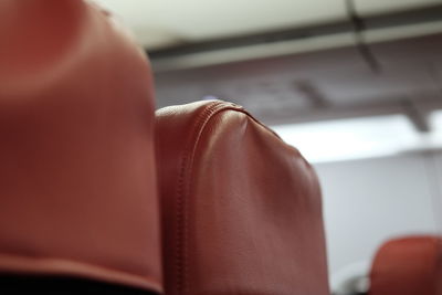 Close-up of leather seats in airplane