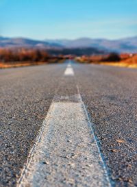 Surface level of road against the sky