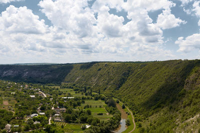 Wide top view orheiul vechi, butuceni, moldova. high angle view of townscape against sky