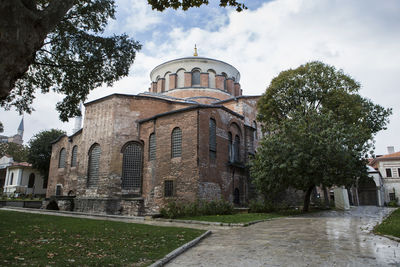 Exterior of historic building against sky