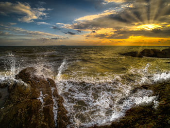 Scenic view of sea against sky during sunset